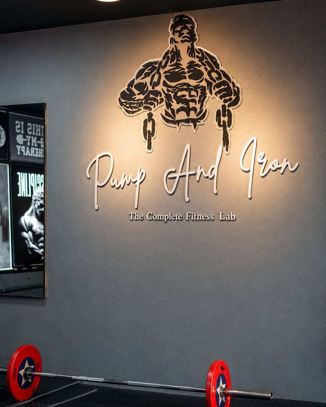 Pump And Iron branded wall